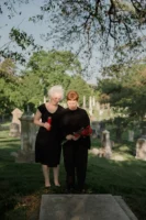 Two elderly women in black - Credits: pexels