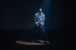 Energetic hip hop musician in - Credits: pexels
