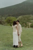 Two women share a joyful - Credits: pexels