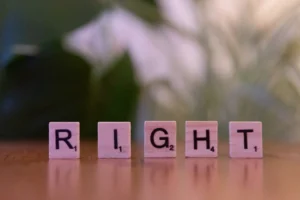 Wooden Scrabble tiles spelling 'Right' - Credits: pexels