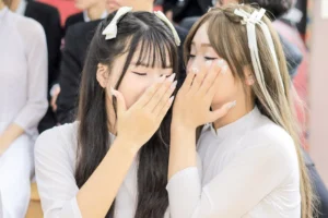 Two young women with bows - Credits: pexels