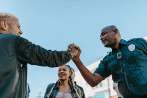 A friendly handshake between a - Credits: pexels