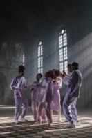 Group of singers performing in - Credits: pexels