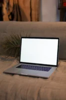 A sleek laptop with a - Credits: pexels