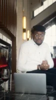 A stylish young man sitting - Credits: pexels
