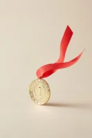 Close-up of a gold medal - Credits: pexels