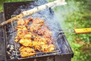 Close-up of grilled chicken on - Credits: pexels