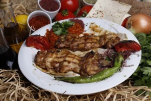 Delicious grilled chicken served with - Credits: pexels