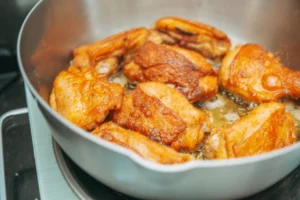 Close-up of crispy fried chicken - Credits: pexels