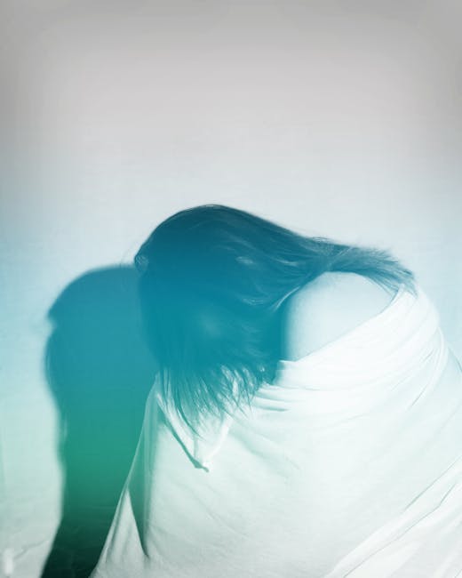 An artistic portrait capturing deep emotion and introspection with abstract lighting. - Credits: pexels.com