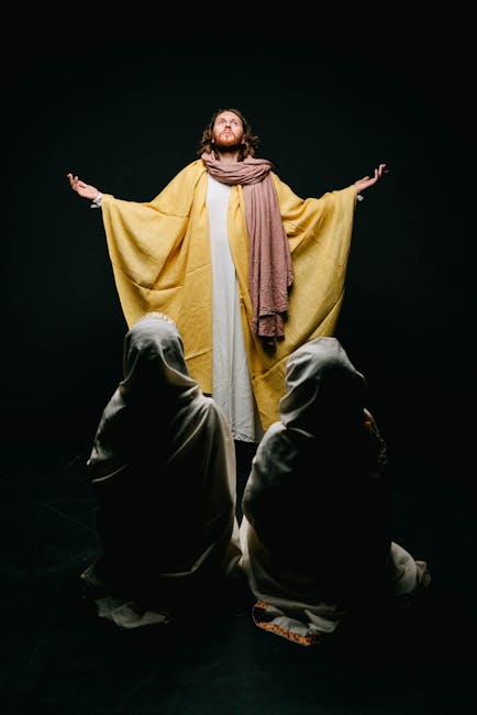 A dramatic portrayal of Jesus with followers, set against a dark background, symbolizing resurrection. - Credits: pexels.com