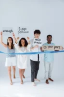 Diverse group of adults holding - Credits: pexels