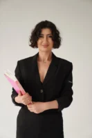 Professional woman in formal attire - Credits: pexels